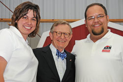Andy Vance and Lindsay Hill with Dr. E. Gordon Gee